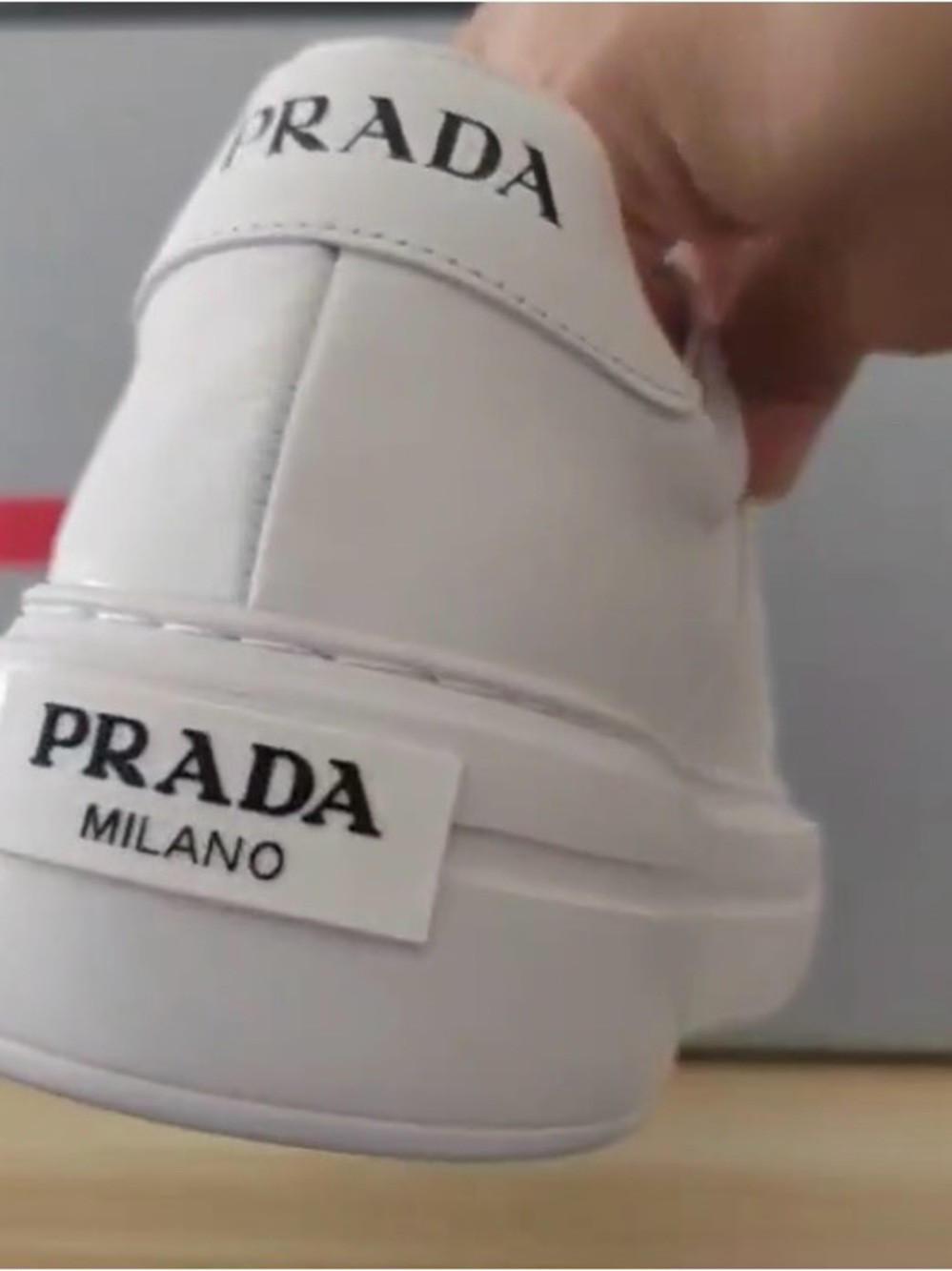Prada White Leather Low-Top Sneaker with Black Logo - Picture 3 of 4